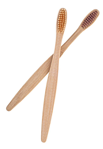 istock Wooden toothbrushes on a white background. Bamboo toothbrush. 1162212500