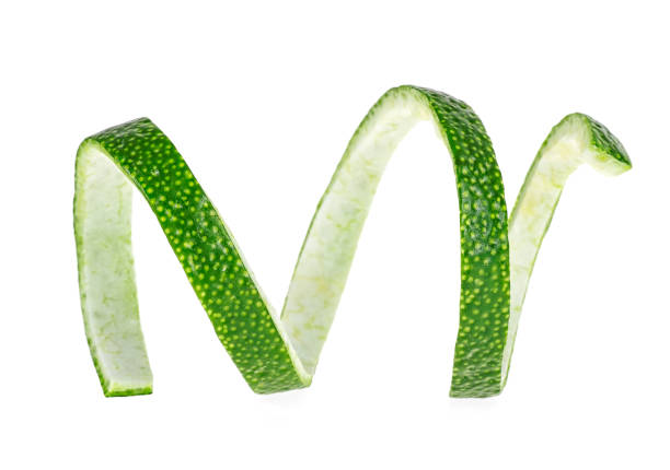 istock Peel of lime over white background, closeup. 1162212507