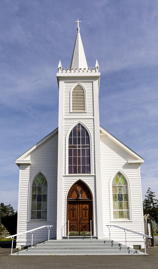 Autumn sugar maple and country church in Vermont