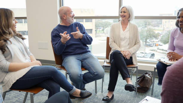 istock Committee has a lighthearted moment during meeting 1162213398