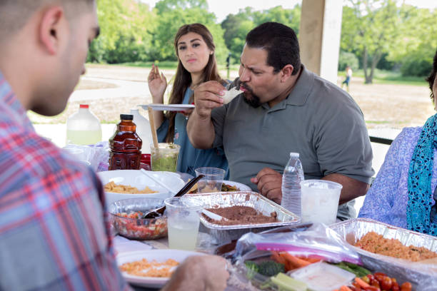 istock Multi-generational family enjoying picnic 1162214960