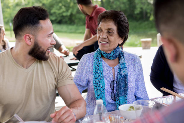 istock Caring grandma talks with adult grandson 1162214975