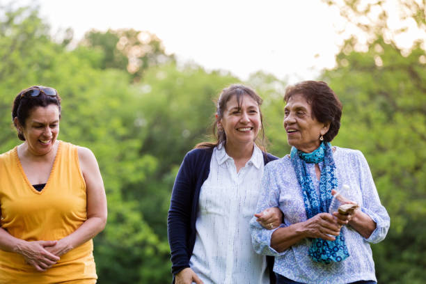 istock Senior mom spending time with adult daughters 1162215263