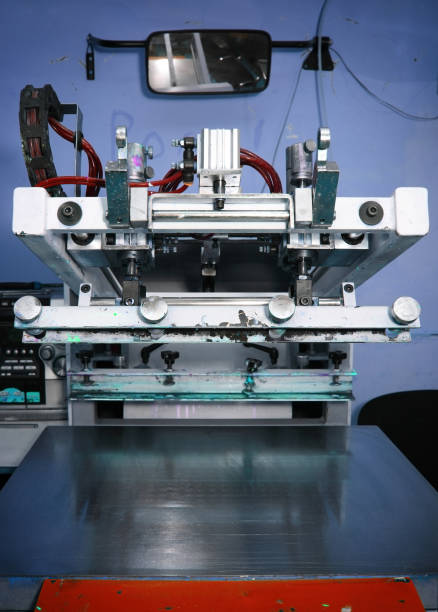 istock Old silk screening machine in the print shop 1162215423