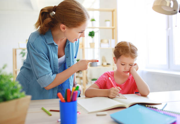 istock mother scolds a child for poor schooling  and homework 1162215446