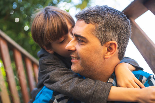 istock Son kissing his father 1162215751