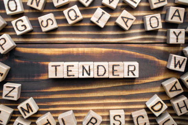 tender composed of wooden cubes with letters - solicitous imagens e fotografias de stock