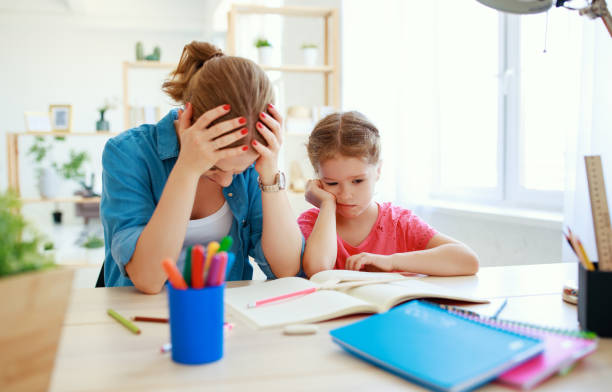 istock mother scolds a child for poor schooling  and homework 1162219656