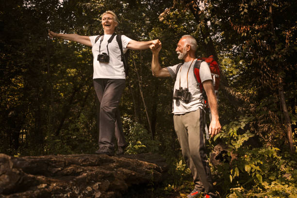 istock Senior couple hiking in forest 1162221469