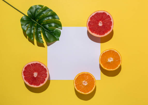 istock Creative fruit composition on yellow background with hard shadows. Summer minimal concept. 1162223865