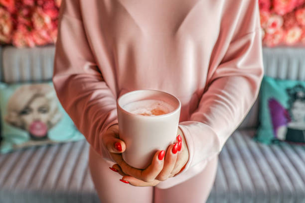 istock Beautiful Female Hands Holding Coffee Cup 1162226134
