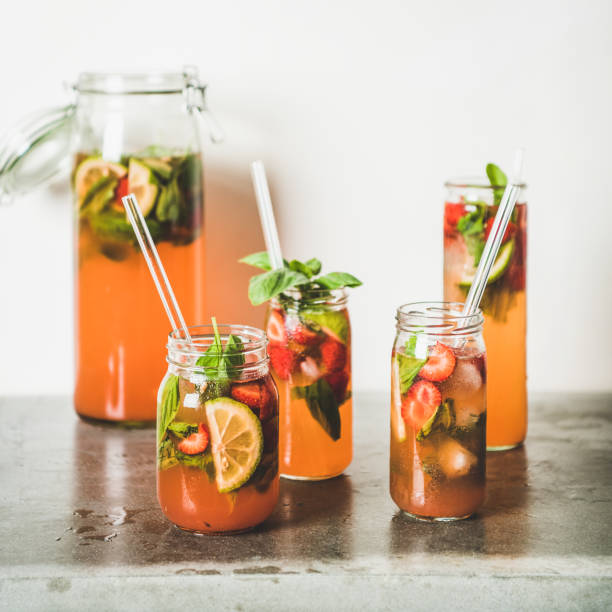 istock Fresh strawberry and basil lemonade on concrete table, square crop 1162228989