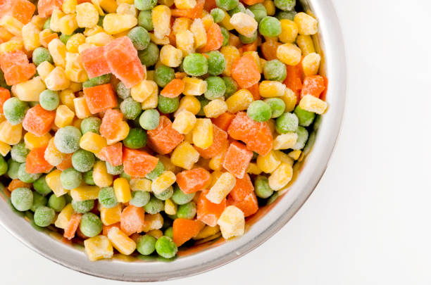 istock frozen mixed vegetable in stainless steel bowl on white background 1162230186