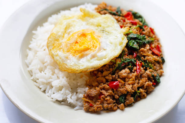 istock Rice topped with stir-fried pork with basil and fried egg 1162240364