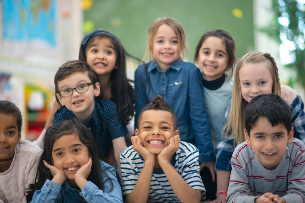 istock Group portrait of smiling elementary kids 1162241528