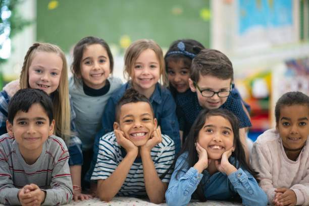 istock Group portrait of smiling elementary kids 1162241532
