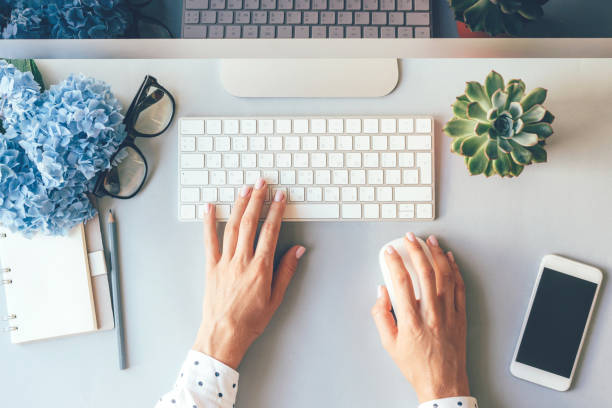 istock Workplace for successful work, elegant female hands on the keyboard of computer in the office 1162242936