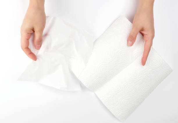 istock female hands holding a clean white paper napkin 1162248614