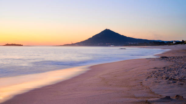 istock Sunset set on the ebach with mountain in background 1162250164