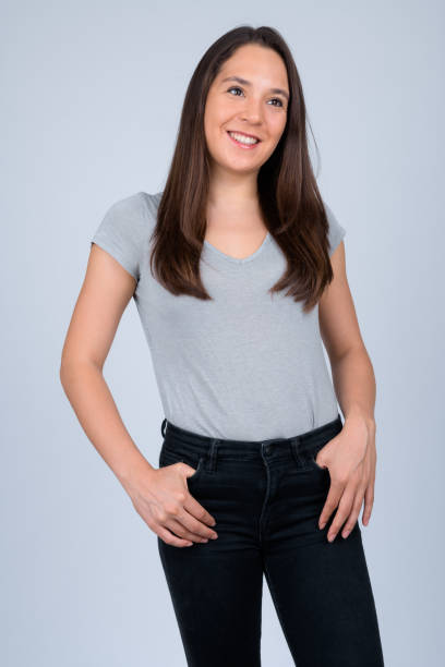 istock Young happy multi-ethnic woman thinking against white background 1162256014