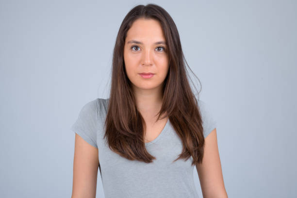 istock Young beautiful multi-ethnic woman against white background 1162256021