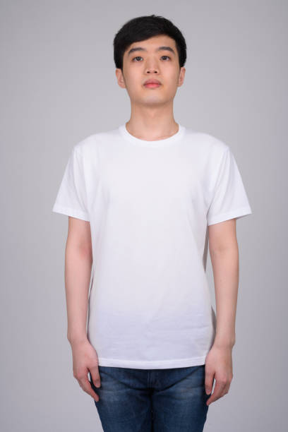 istock Studio shot of young Asian man looking at camera 1162256217
