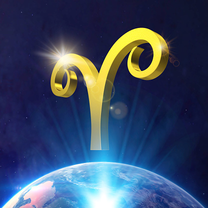 3D gold aries astrology sign is standing above a colorfull planet in space with blue light rays from below.