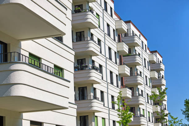 istock Modern white tenement house 1162259585