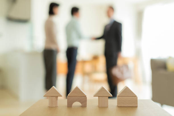 Businessman greeting a middle aged couple