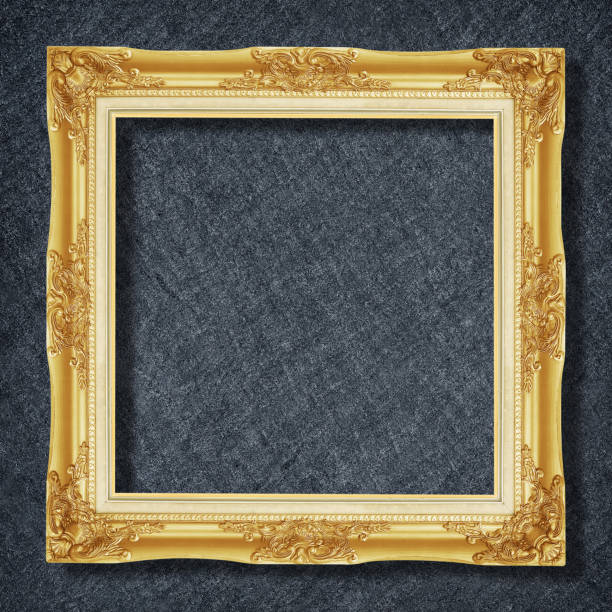 istock gold frame on Dark grey black slate background or texture. 1162266750