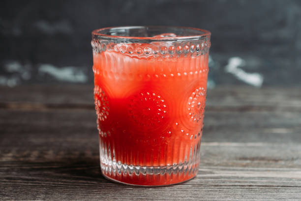 istock Old fashioned cherry cocktail with berries and spices 1162267450