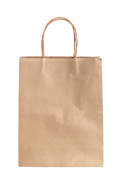 istock Blank brown paper bag isolated on white background 1162269763