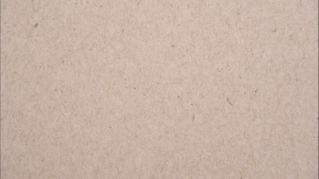 stop motion brown paper animation texture . 4k 3840 × 2160 video footage