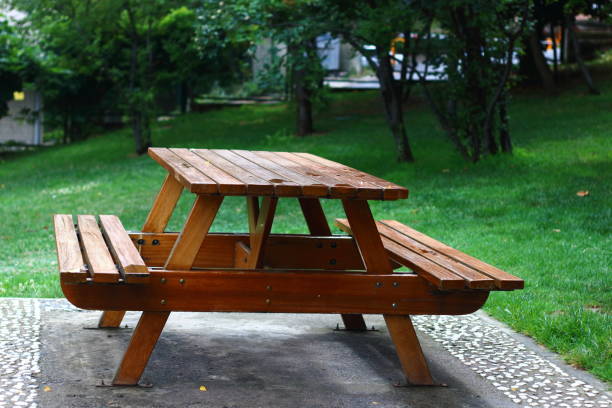A wooden table for picnic at the park