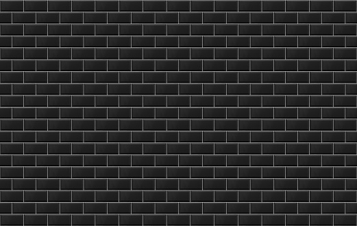 Panoramic image of black ceramic metro tile wall. Black tiles texture background.