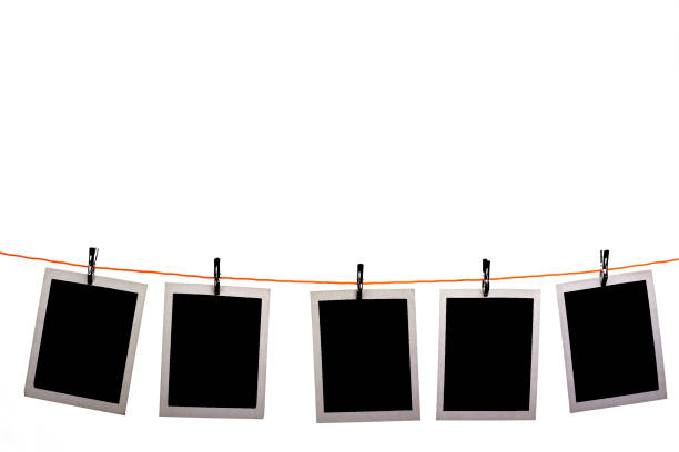 istock Blank polaroid pictures hanging 1162279541