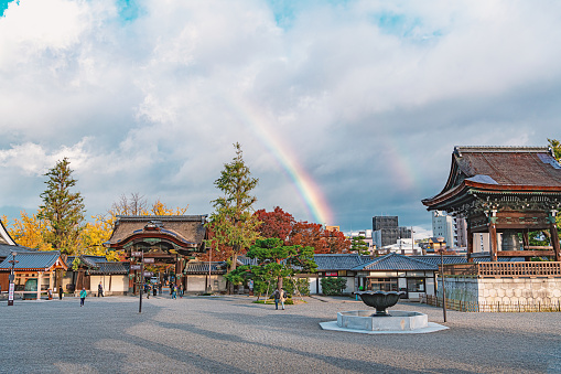 Kyoto, Kyoto, Japan - November 14 2018 : Autumn scenery after rain of the Higashi Hongan-ji temple. It was established in 1602 by the shogun Tokugawa Ieyasu when he split the Shin sect in two (Nishi Honganji being the other) in order to diminish its power.