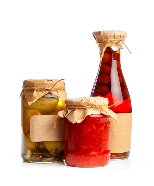 istock set og  glass bottles with preserved food on white background - Image 1162284072