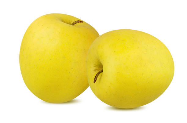 istock Yellow apple isolated on white background with clipping path 1162285487