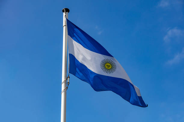 istock Argentinian flag waving against clear blue sky 1162285933
