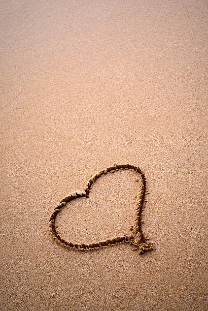 istock Heart In The Sand 116228605