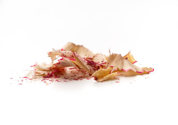 istock Pink pencil wooden shavings on white background 1162286700