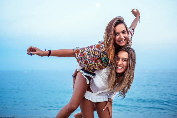 istock Two friends at a Mediterranean beach 1162290456