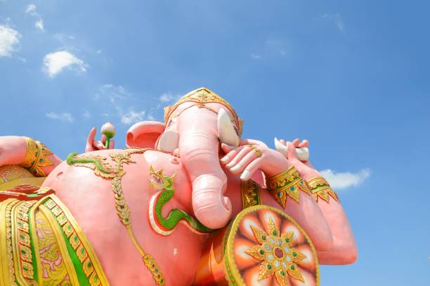 istock pink ganesha statue on blue sky 1162291251