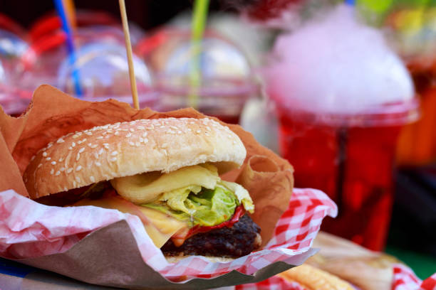 istock Burger on a wooden board 1162296872
