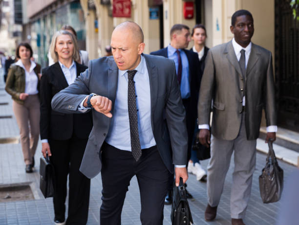 istock Man in business suit hurry up 1162299505
