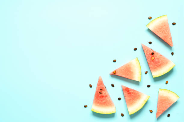 istock Fresh red watermelon slice Isolated light blue background.  Summer concept.Top view, Flat lay, Copy space. - Image 1162301288