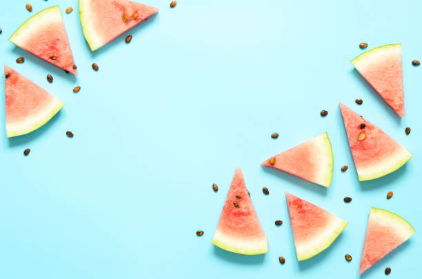 istock Fresh red watermelon slice Isolated light blue background.  Summer concept.Top view, Flat lay, Copy space. - Image 1162301297