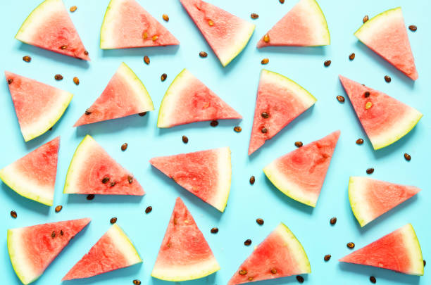istock Fresh red watermelon slice Isolated light blue background.  Summer concept.Top view, Flat lay. - Image 1162301301