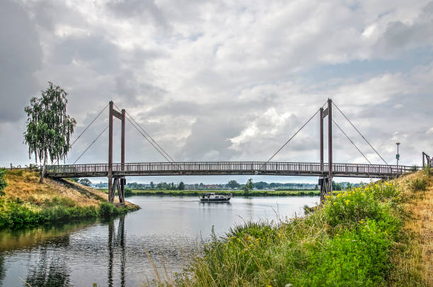 Farø, Faro or Faroe Bridge in Denmark. The main E55 motorway runs over this  bridge that links the main island of Zealand to the left, via the tiny island of Faro, with the island of Falster to the right, in a wider context it links by road, Sweden, Denmark and in a few years when the last bridge in finished with northern Germany. Colour, horizontal format with lots of copy space.